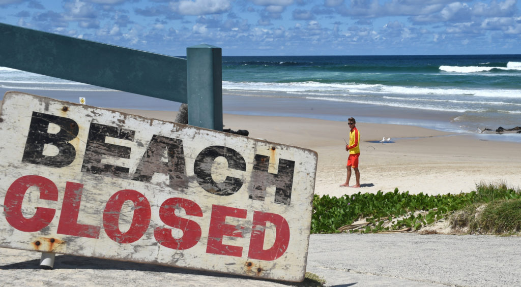 shark attack beach closed sign
